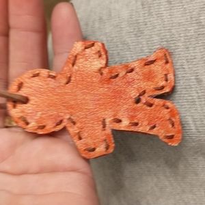 Orange leather gingerbread man Purse charm, key chain, zipper pull.